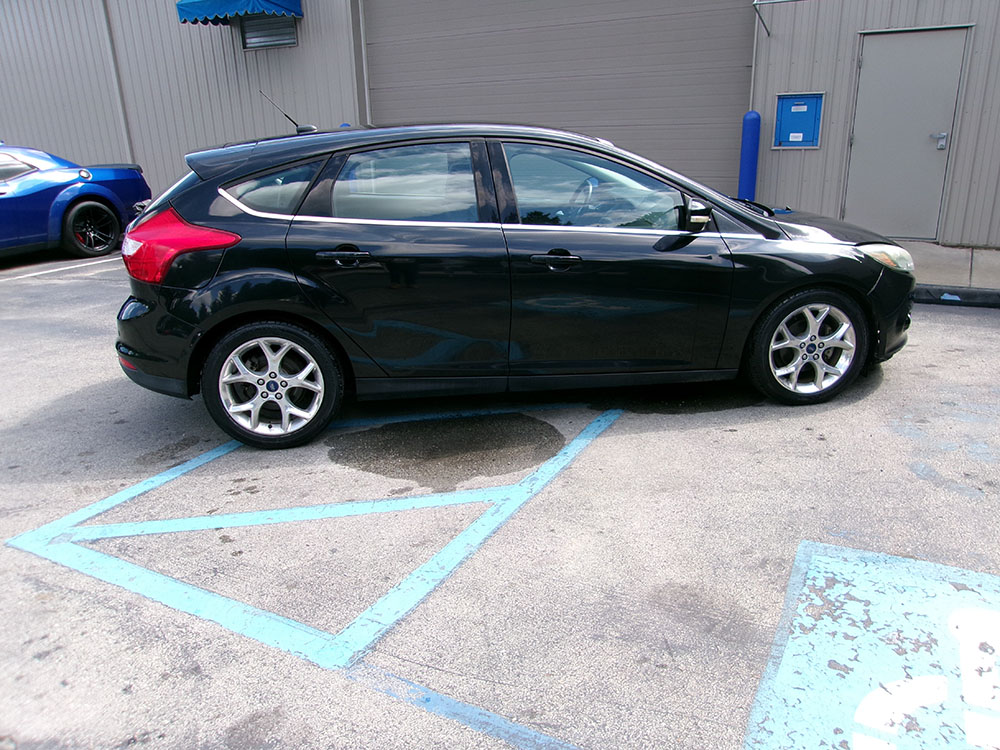 
								2014 Ford Focus Titanium full									